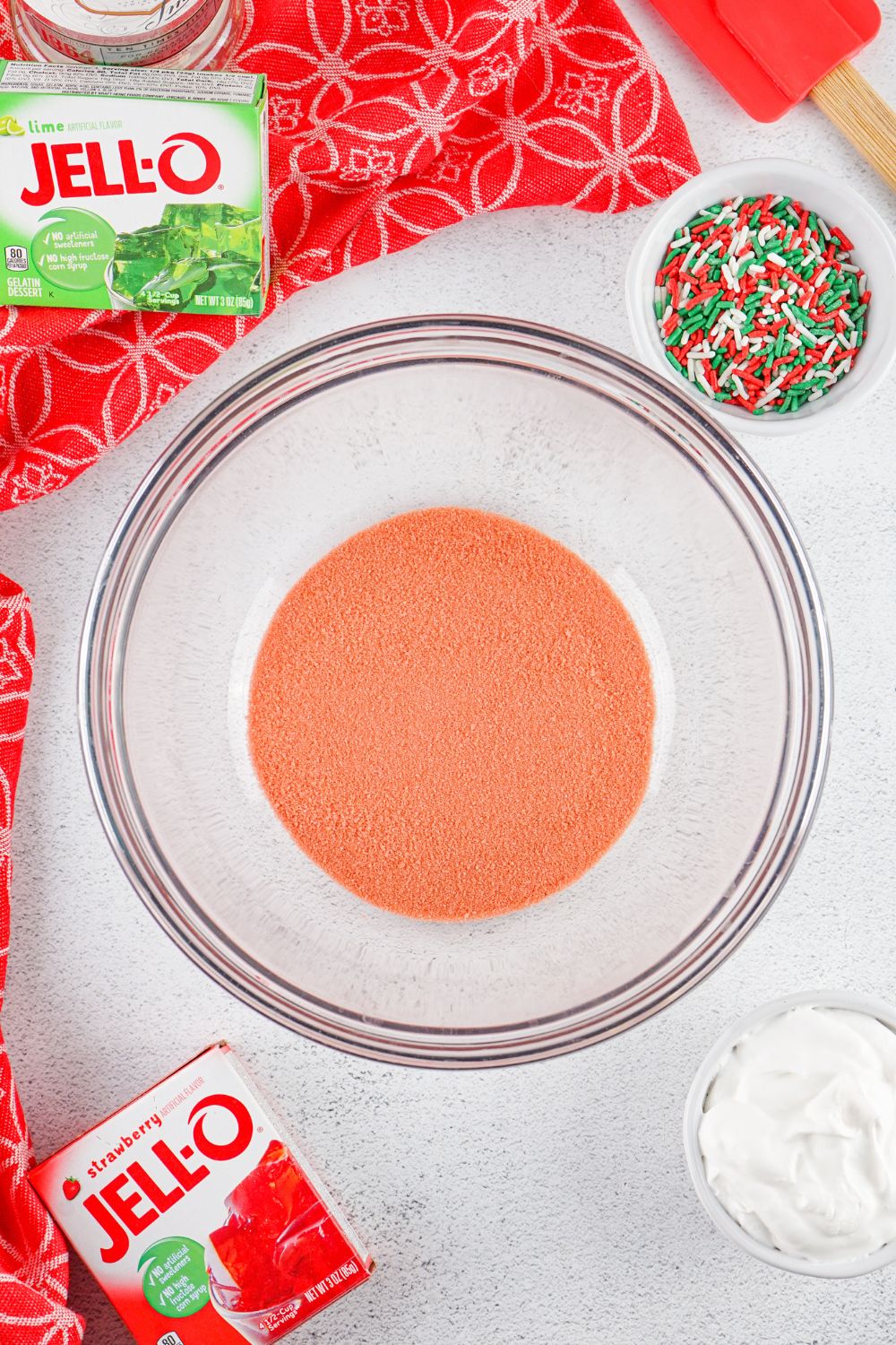 jello mixture into a glass bowl
