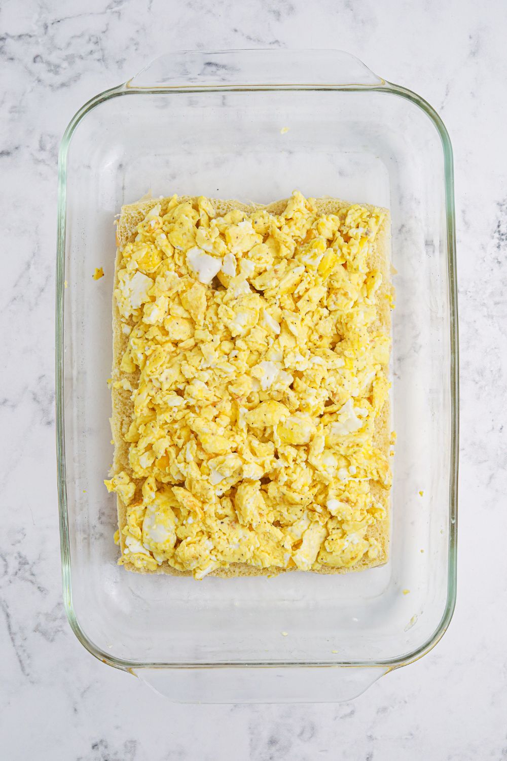 scrambled eggs on top of slider buns for the process images for Breakfast Sliders