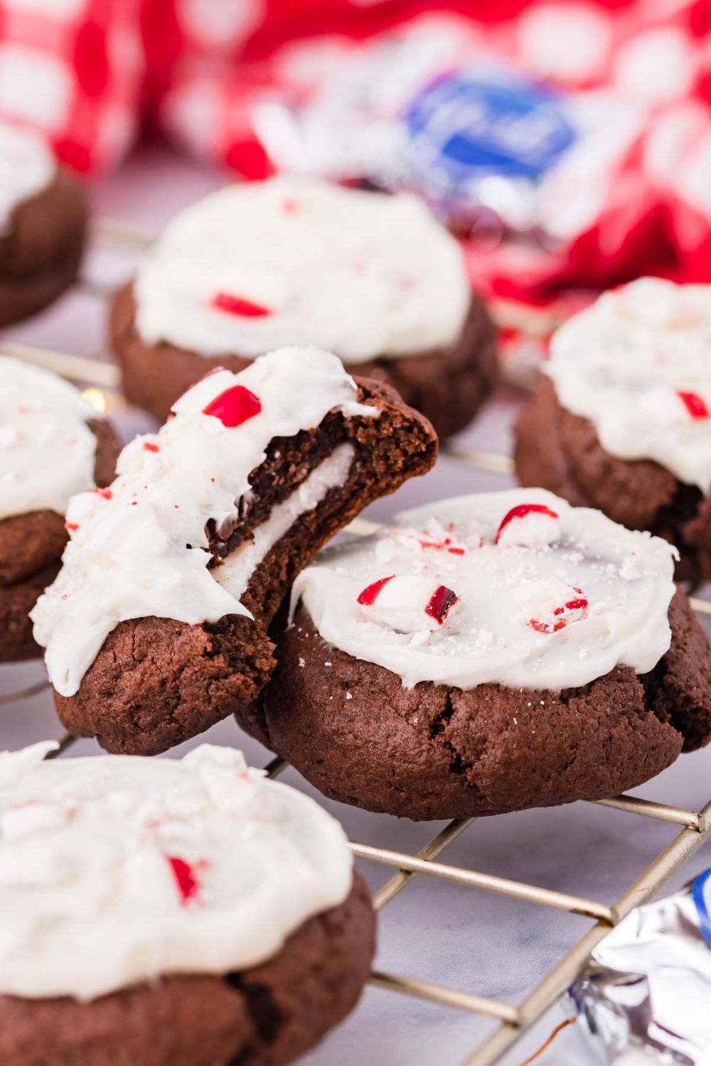 cookies on cooling pan with one that has a bite taken out and placed tilted 