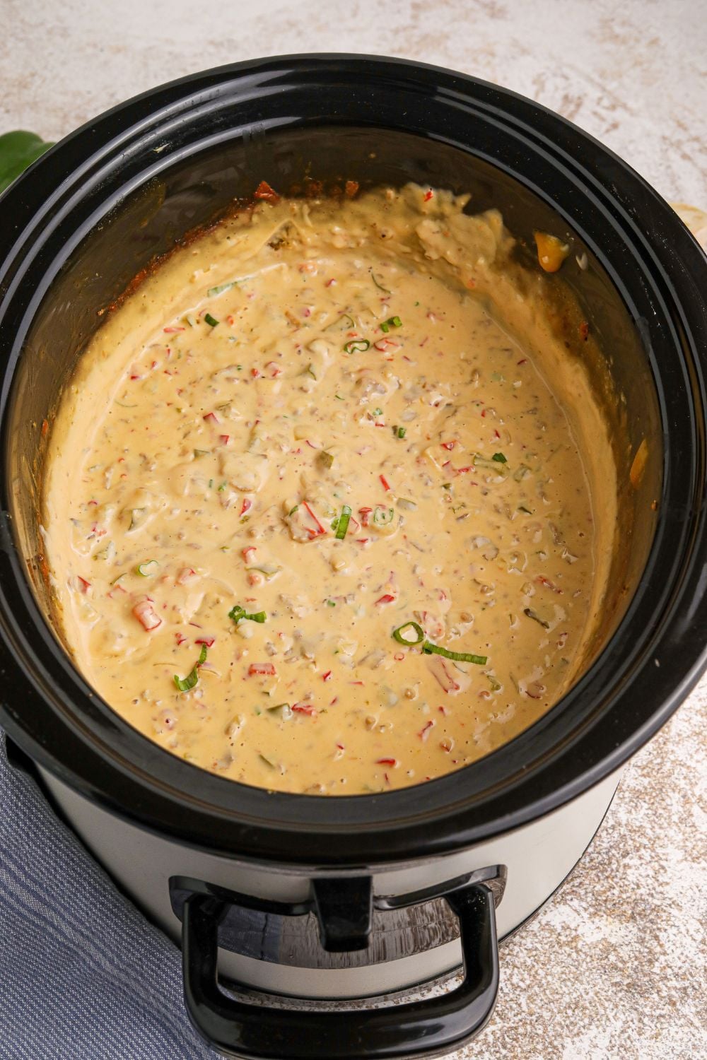 Crock Pot Philly Cheesesteak Dip in a crockpot sitting on a table