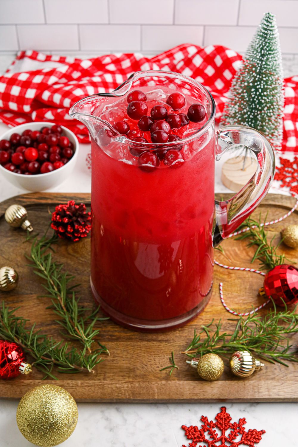 santa punch in a glass pitcher
