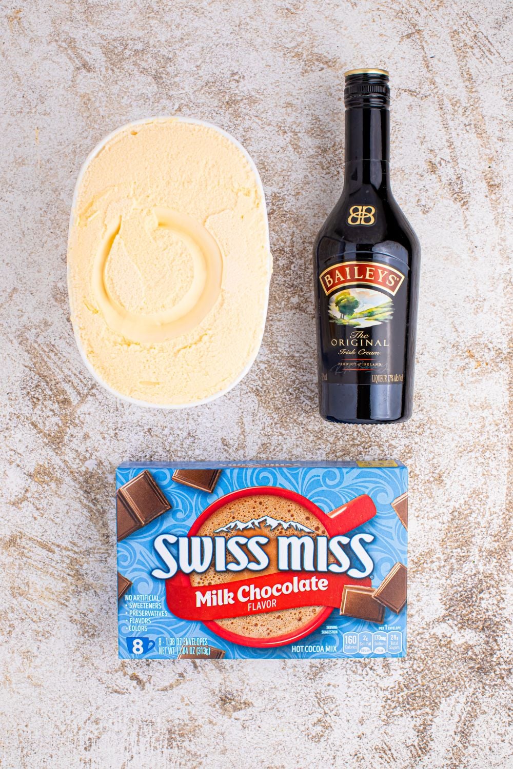 ingredients for making a snowman drink on table