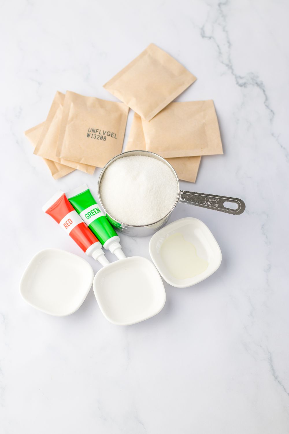 ingredients for spiced drops on a marble countertop