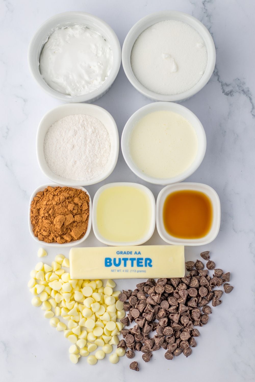 ingredients for a fudge on table in small bowls