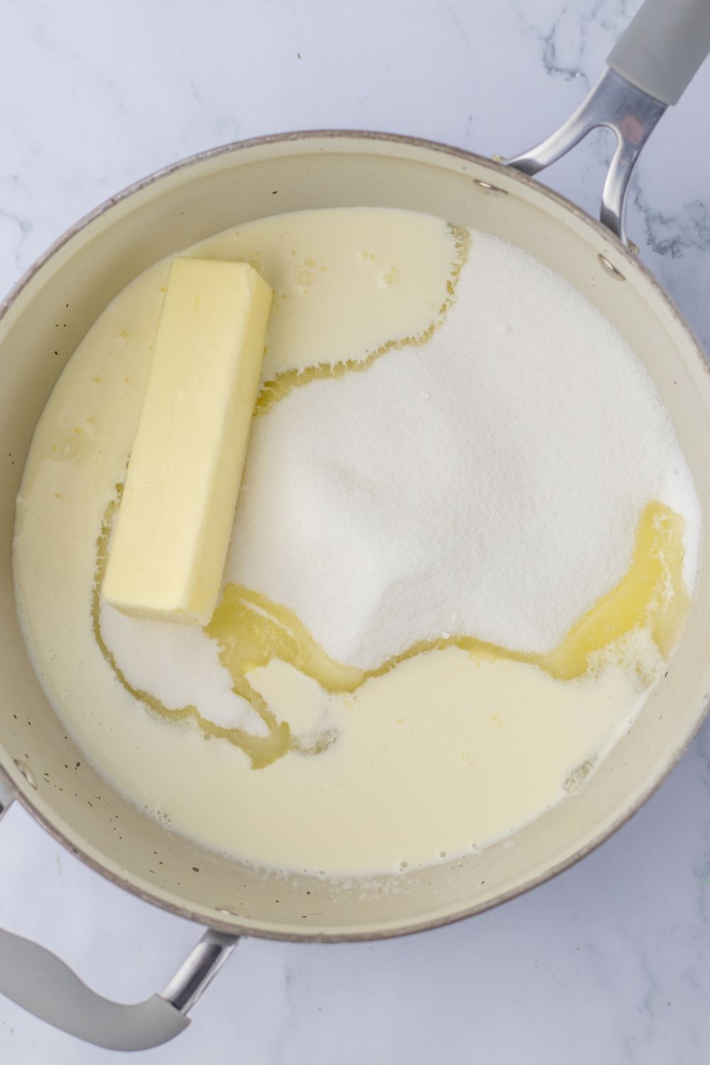 butter and sugar mixture in a pan on table