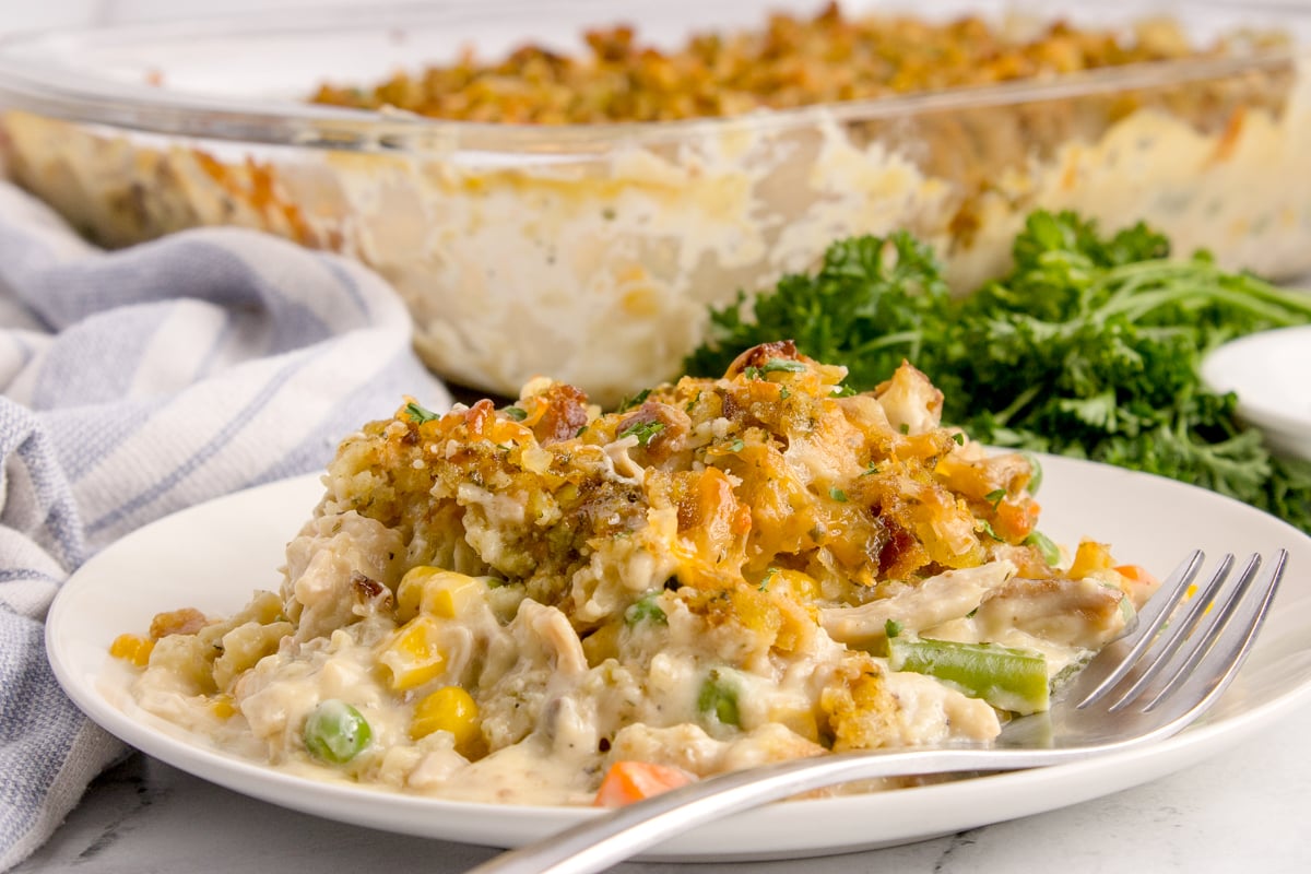 close up view of Chicken Stuffing Casserole on a white plate