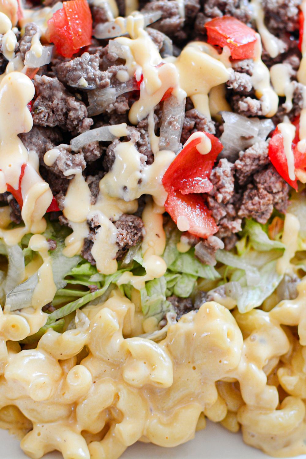 Big Mac Macaroni And Cheese close up view of it on a platter