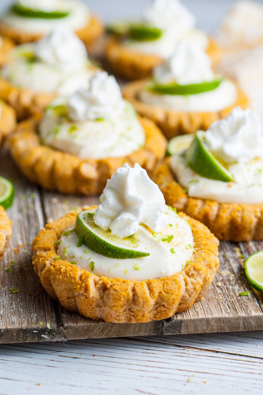 Crumbl Key Lime Pie Cookies on a wooden table