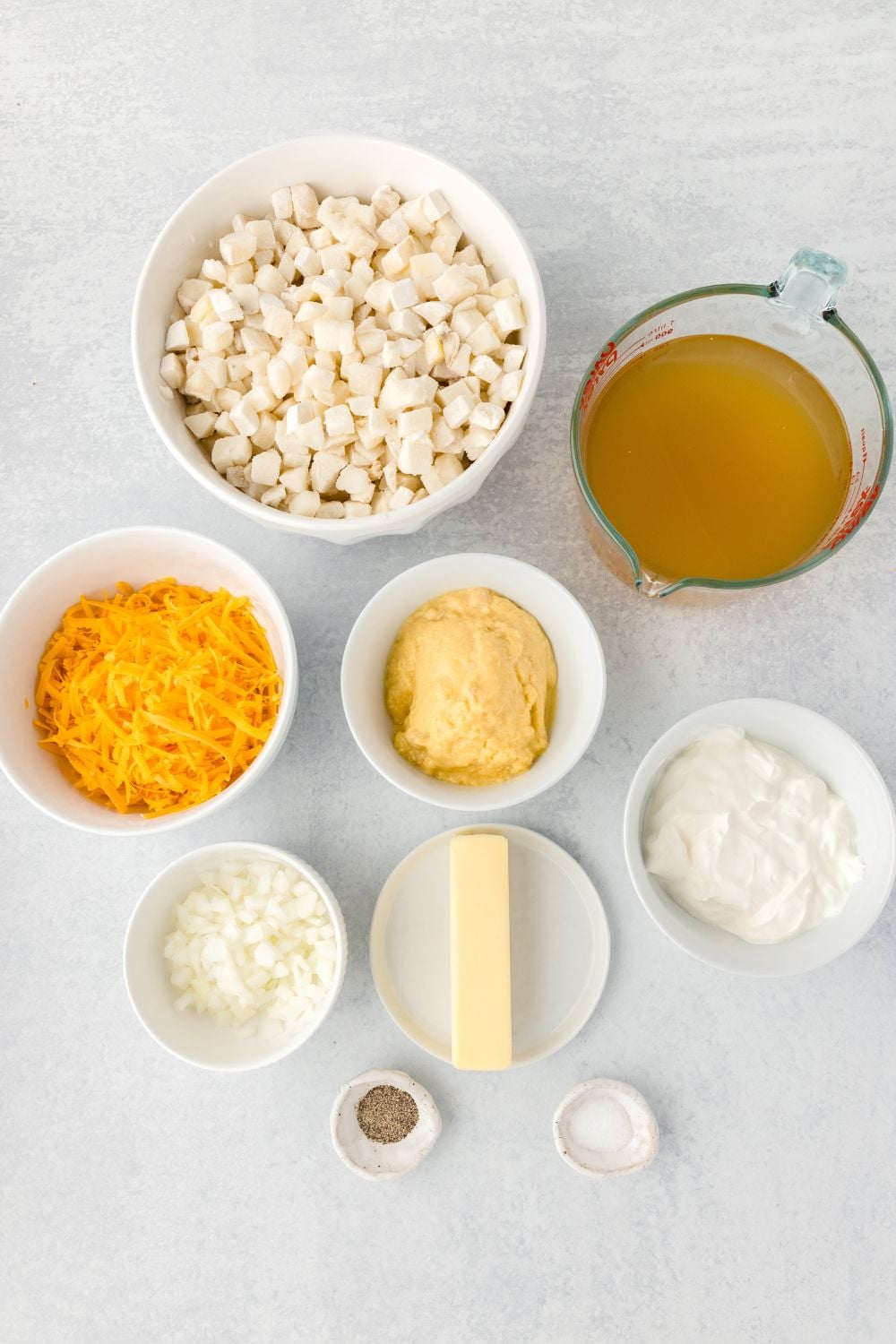 ingredients for Hash Brown Potato Soup in glass bowls on table