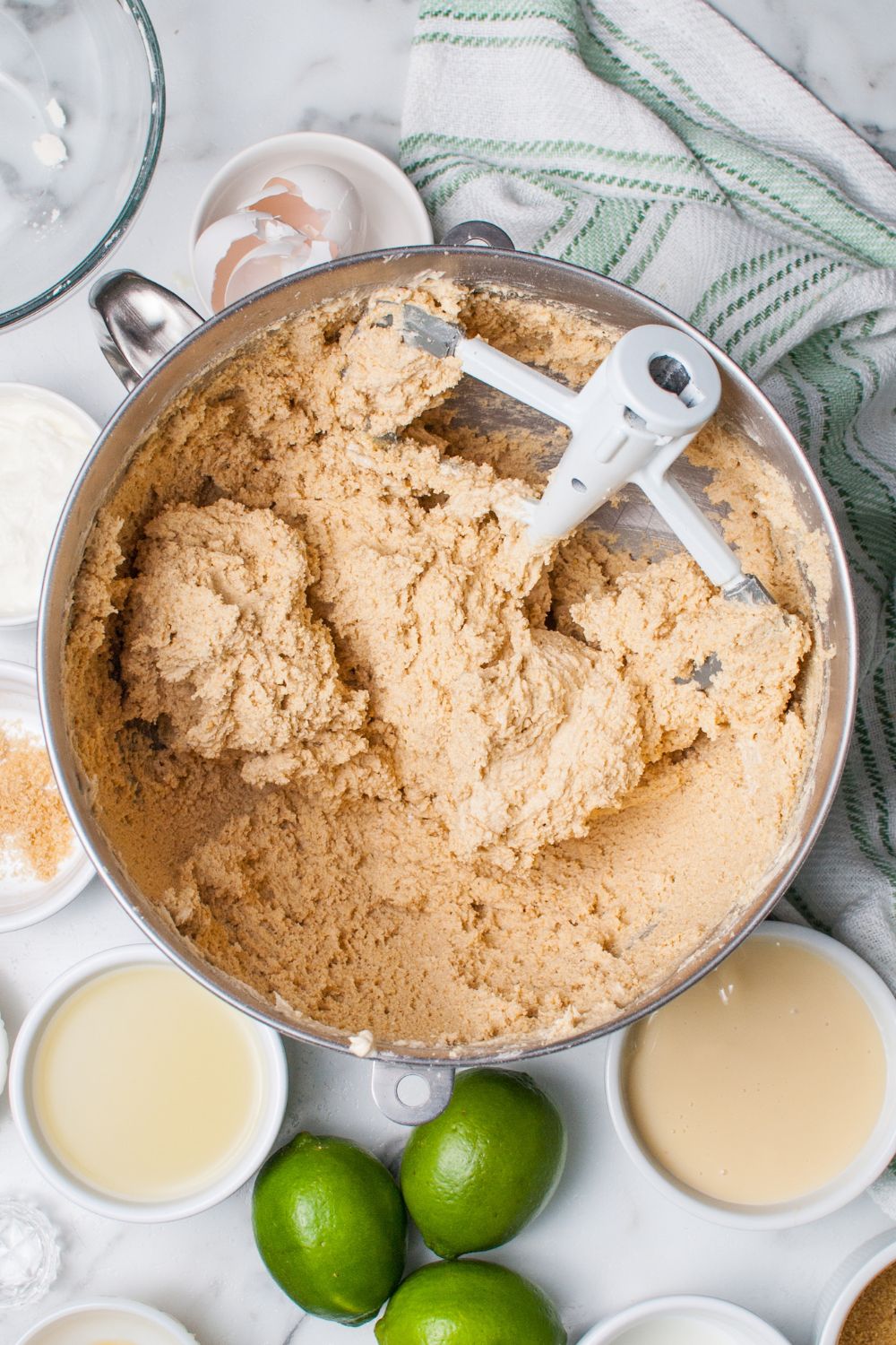 Crumbl Key Lime Pie Cookie dough in a mxing bowl on table