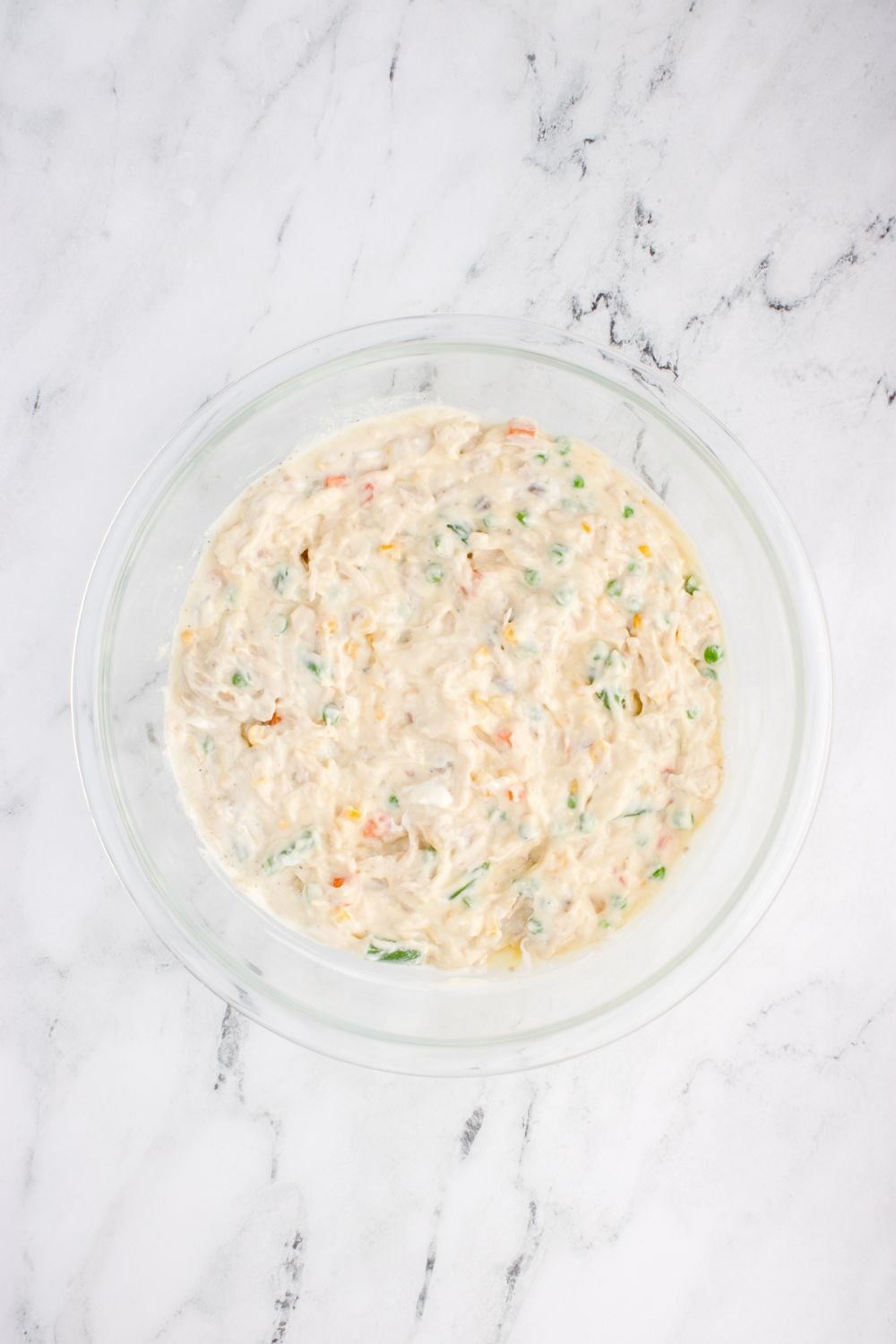 glass bowl with Chicken Stuffing Casserole filling in it