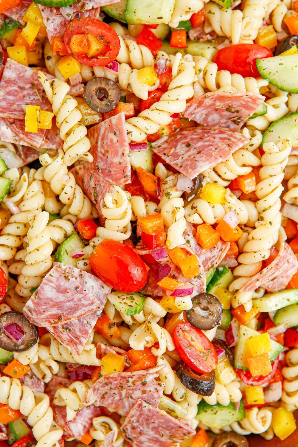 close up of Summer Pasta Salad in a bowl loaded with meat, veggies and pasta 