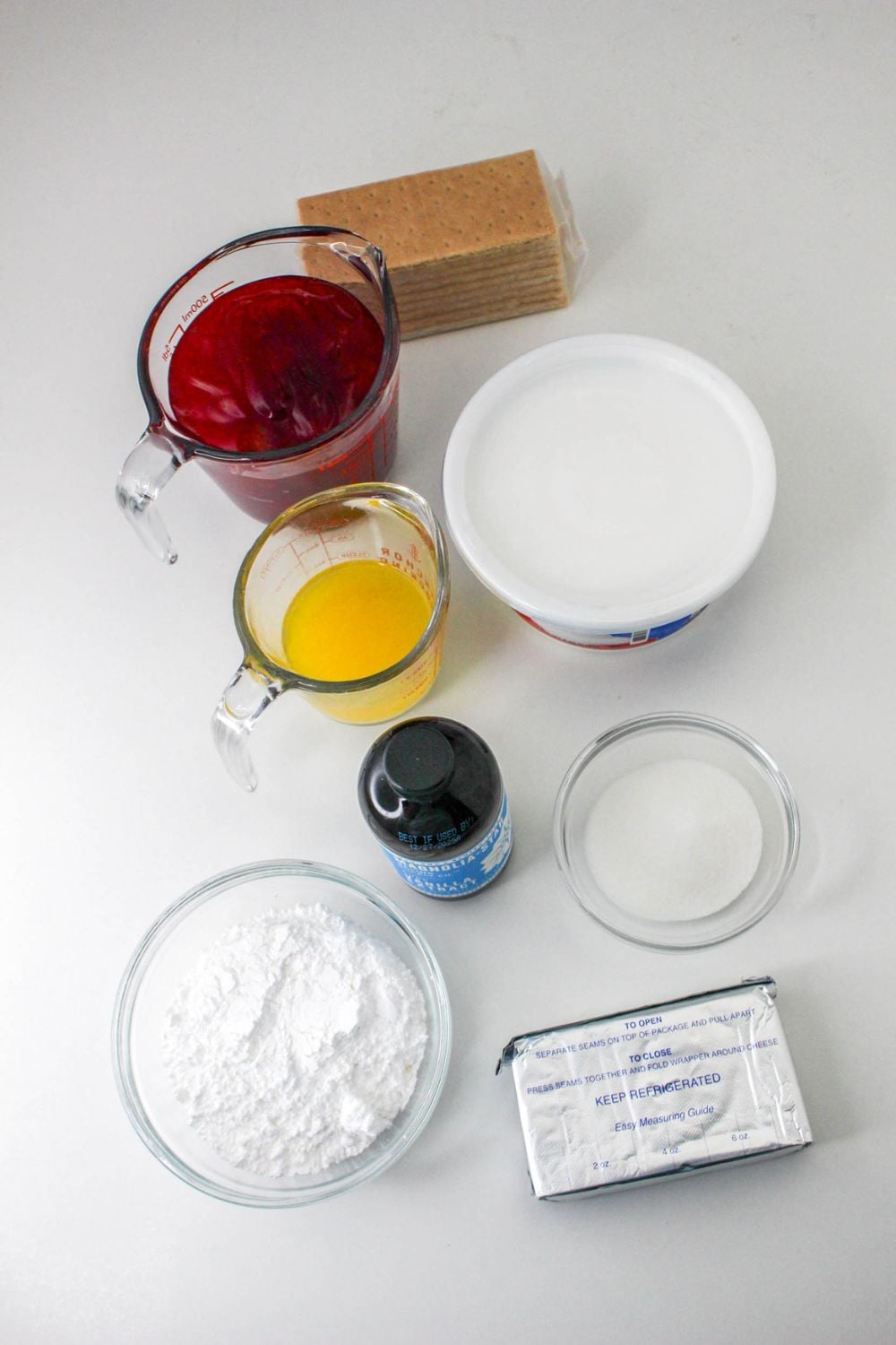 No Bake Strawberry Delight ingredients in separate bowls on table to show what is in the recipe