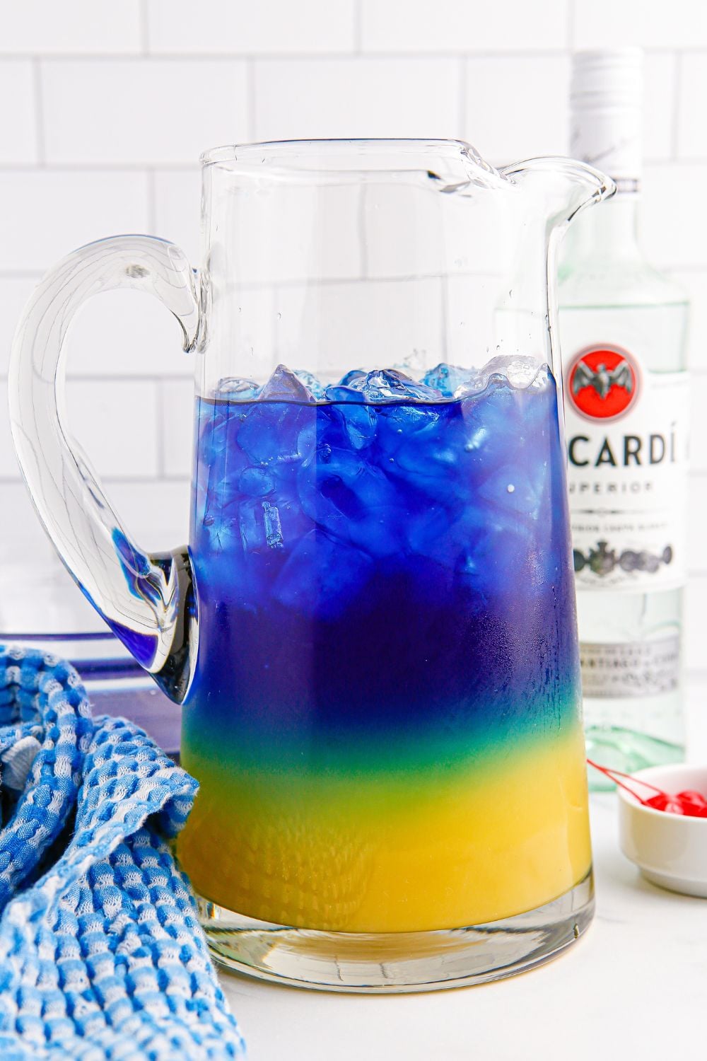 Blue Hawaiian Punch layered in a glass pitcher