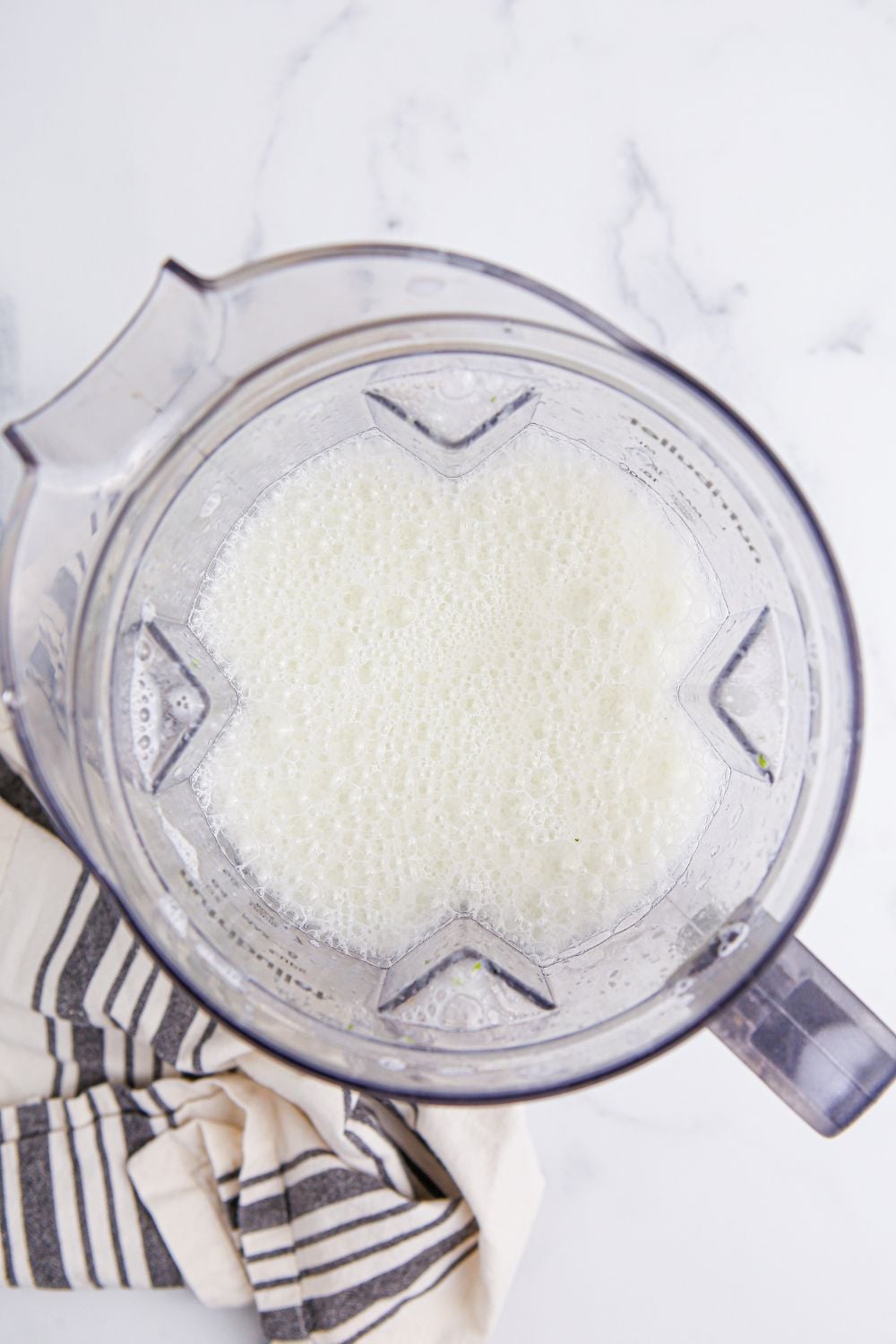 Brazilian Limeade blended up in a blender with a look into the blender