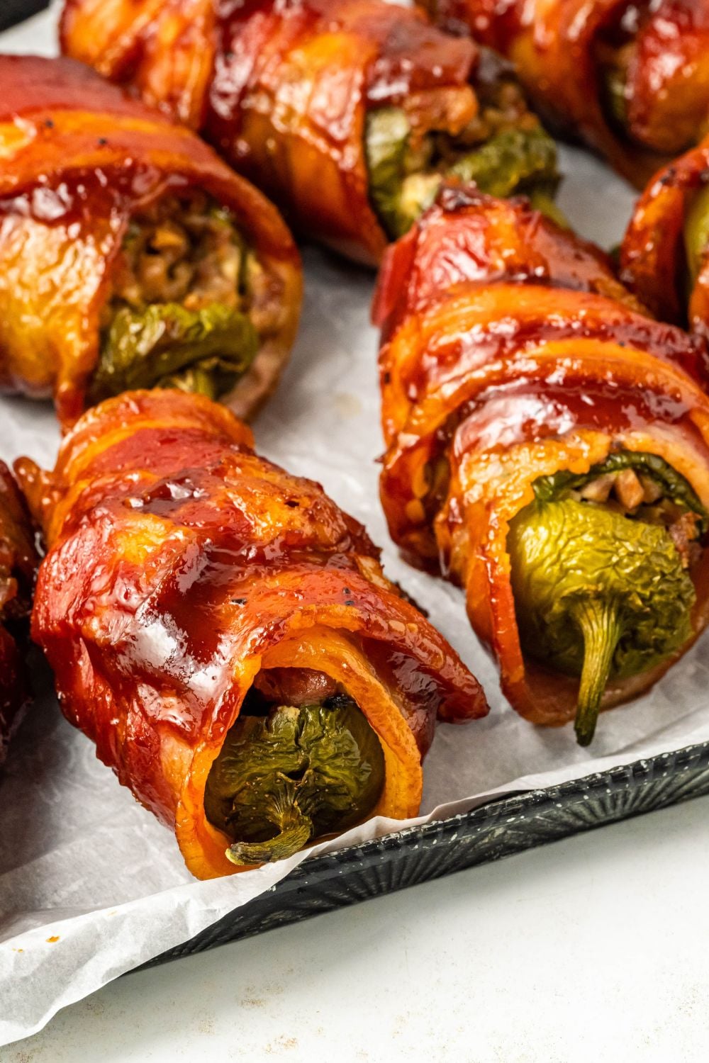 Texas Twinkies on a cookie sheet spread out on pan