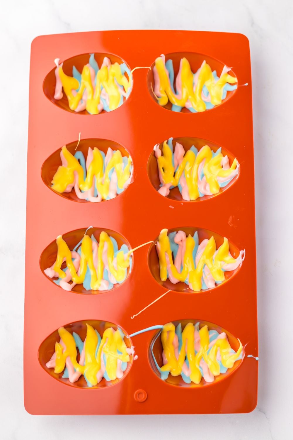 Easter Marshmallow Eggs colored chocolate drizzled in silicone mold 