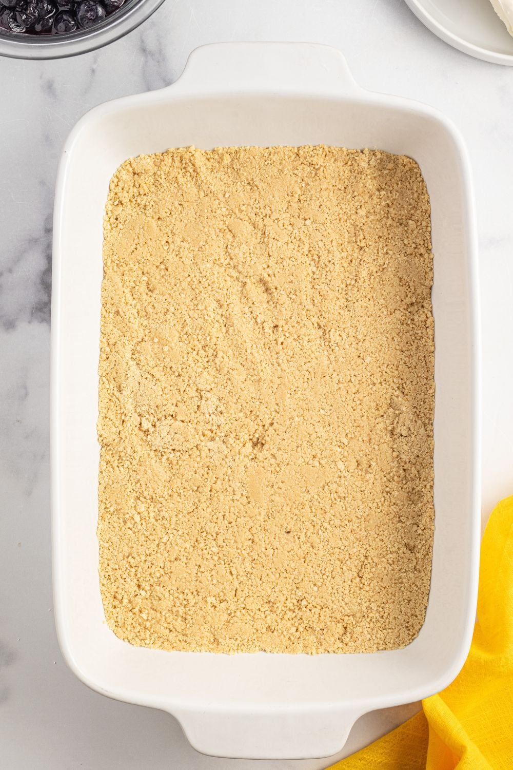 graham cracker crust pressed into pan for making Lemon Blueberry Lush