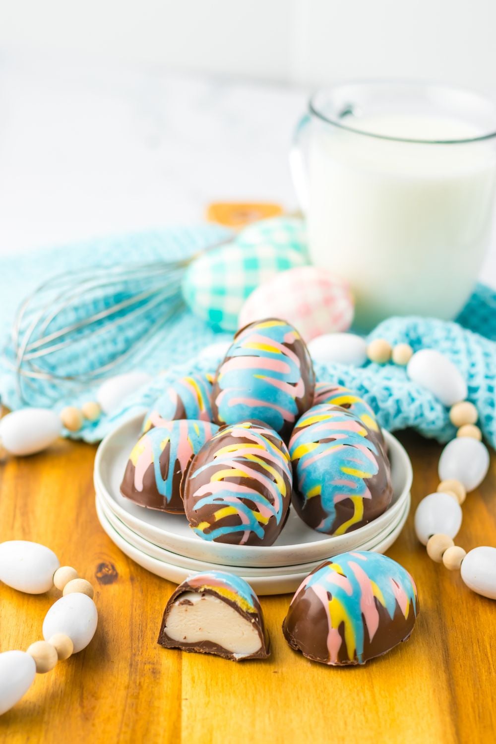 Easter Marshmallow Eggs in a tray with an egg sliced in half 