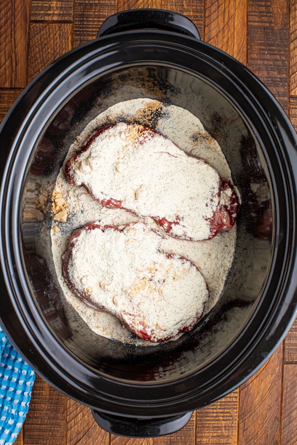 Slow Cooker Mississippi Ribeye Steaks with ranch and au jus powder over seaks