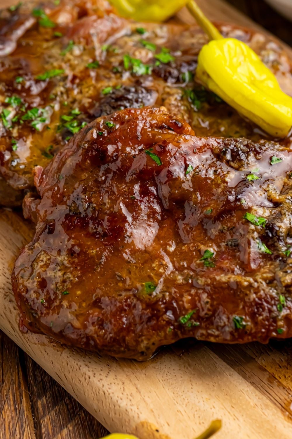 Mississippi Ribeye Steaks on a wooden cuting board on table