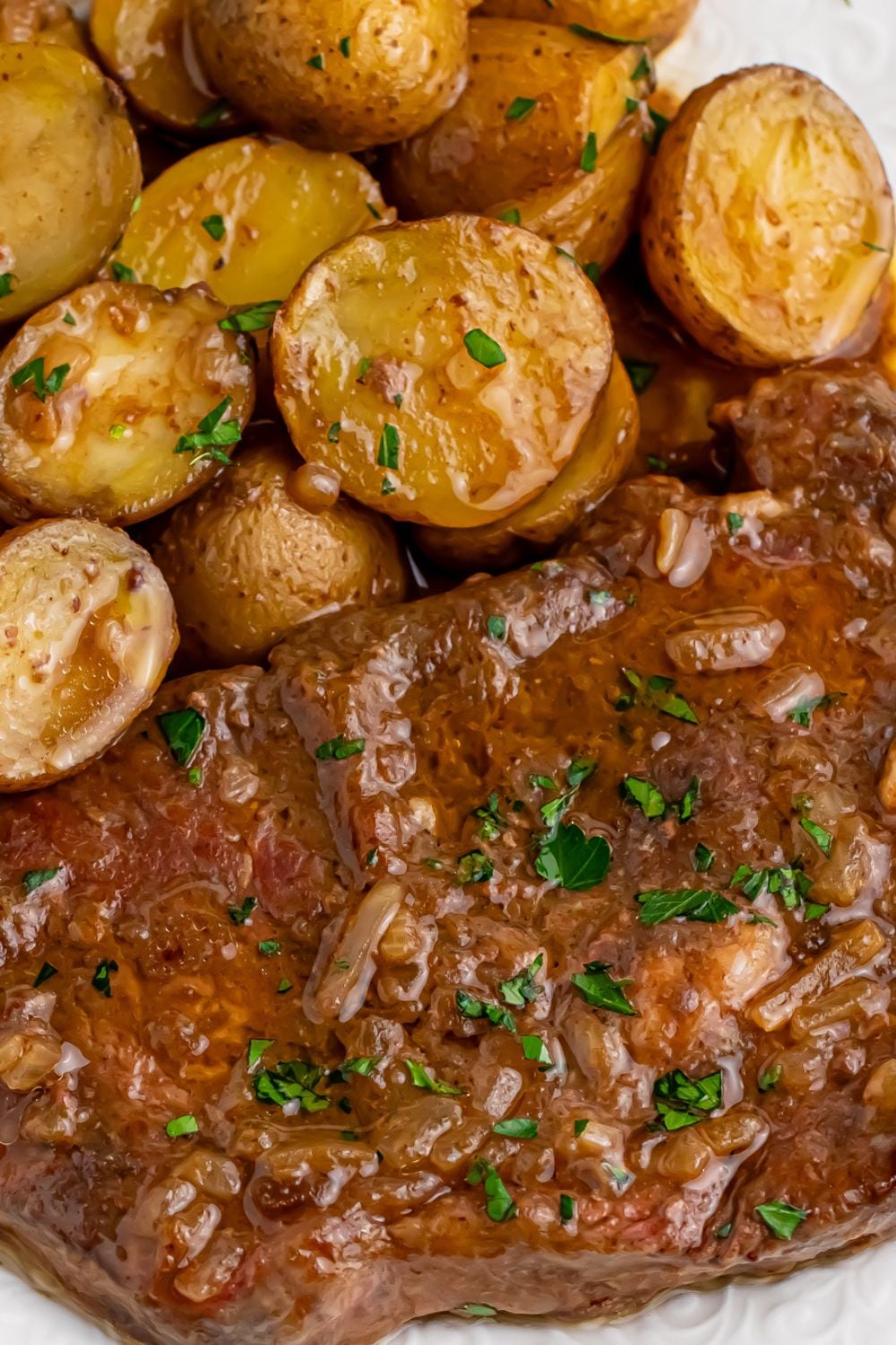 close up of crock pot steak on a plate
