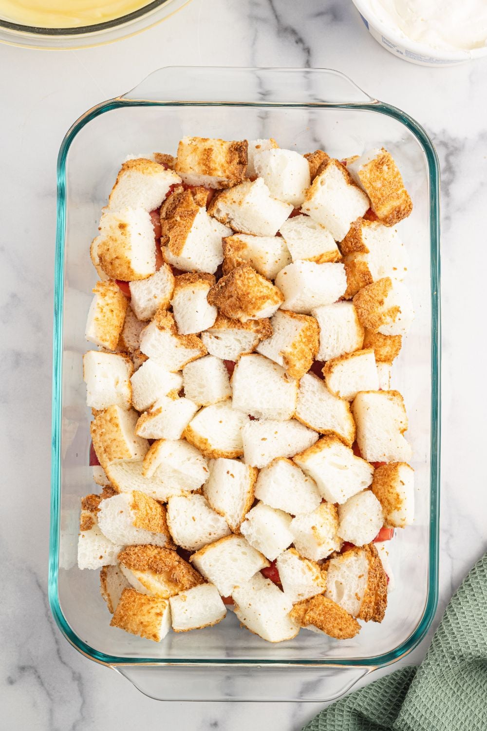layers of angel food cake in a 9x13 pan
