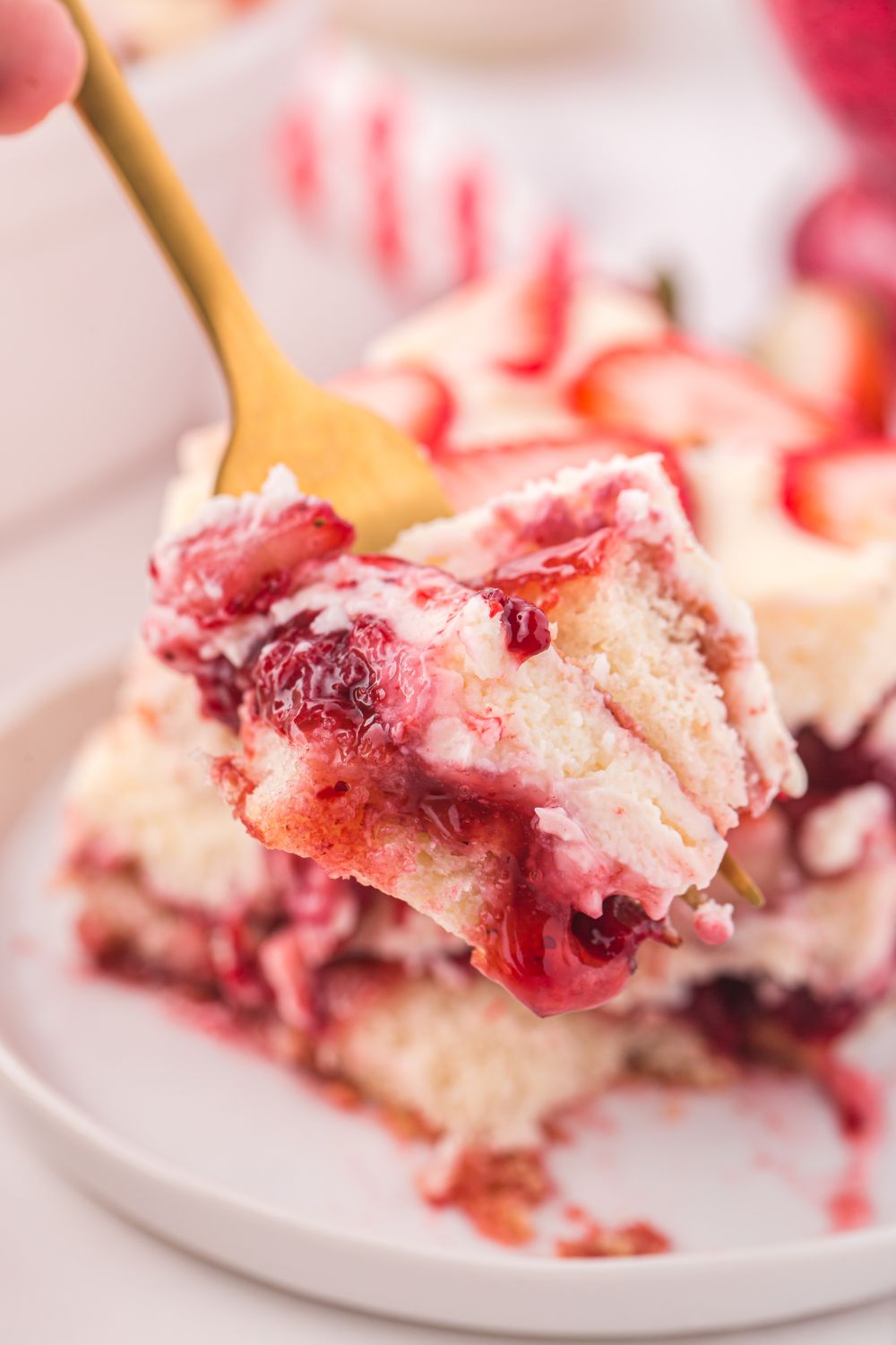 fork with a bite of Strawberry Tiramisu on it