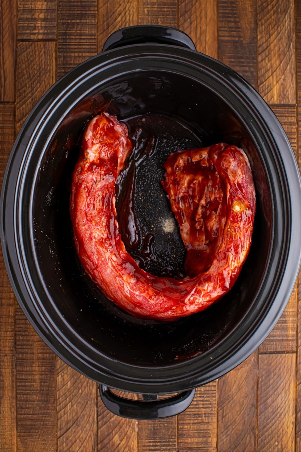 bbq basted Slow Cooker Coca Cola Ribs in a slow cooker 