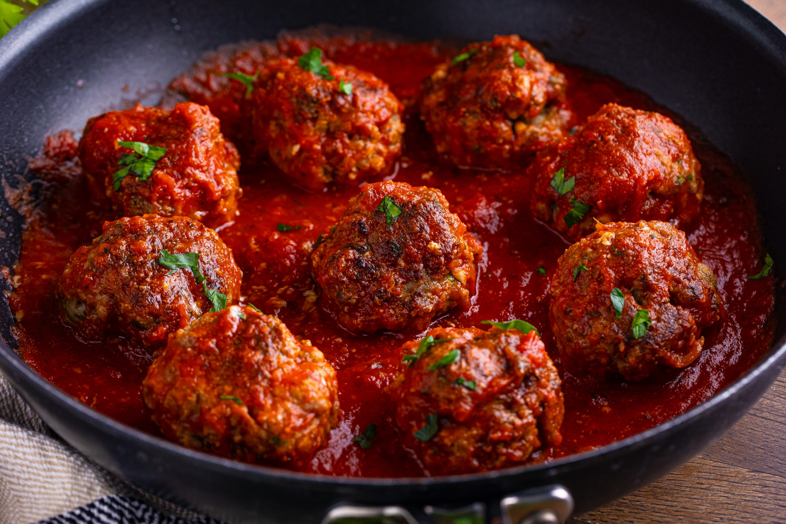 Classic Italian Meatballs in a pan 
