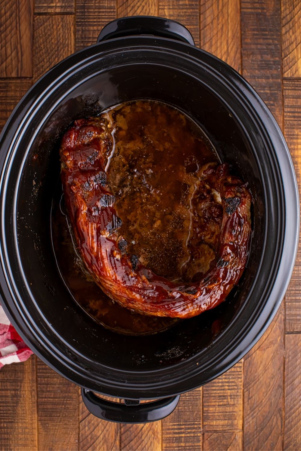 overhead look of Slow Cooker Coca Cola Ribs fully cooked in slow cooker 