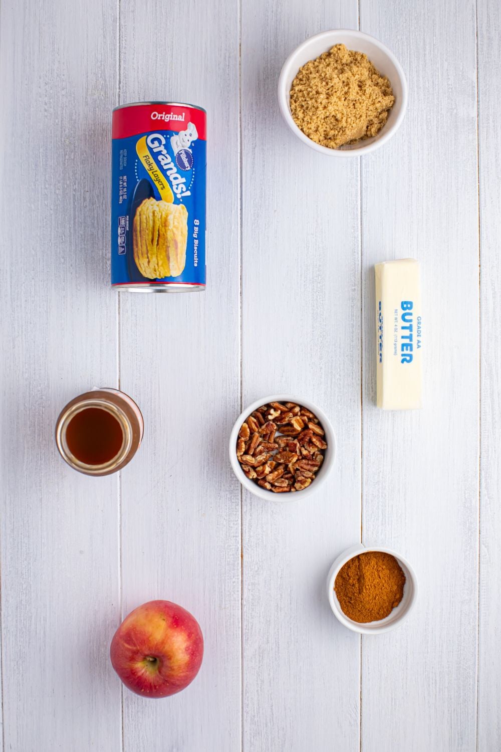 Apple Pie Pull Apart Bread ingredients on table in single serve bowls on table