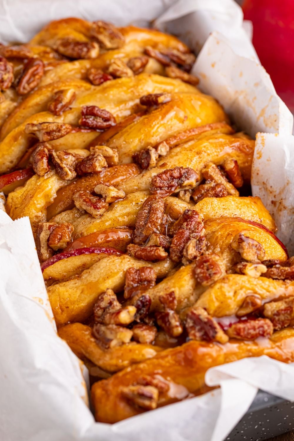 biscuit pull-apart bread with nuts and apples and caramel in it
