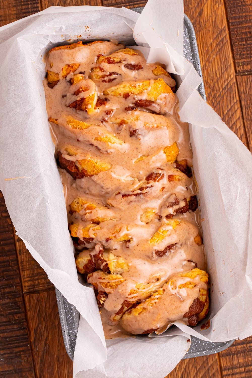 Pumpkin Pie Pull Apart Bread in pan sitting on table 
