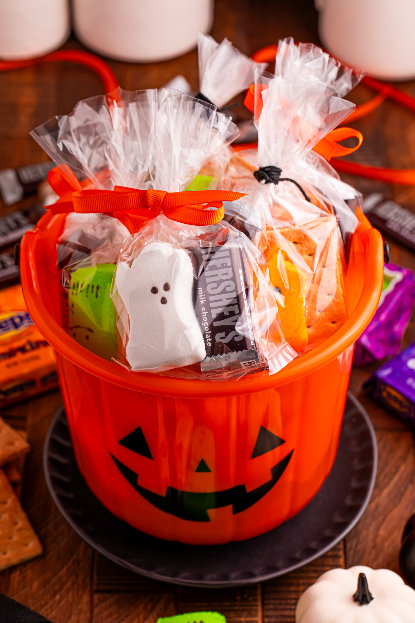 Halloween Smores Gift Bags in a Halloween bucket on table 