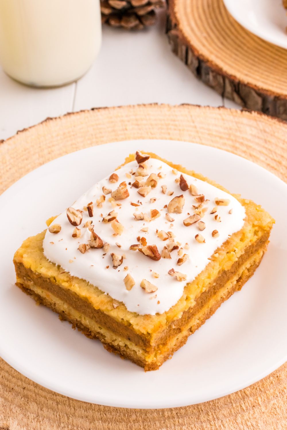 plate with layered pumpkin cake on table