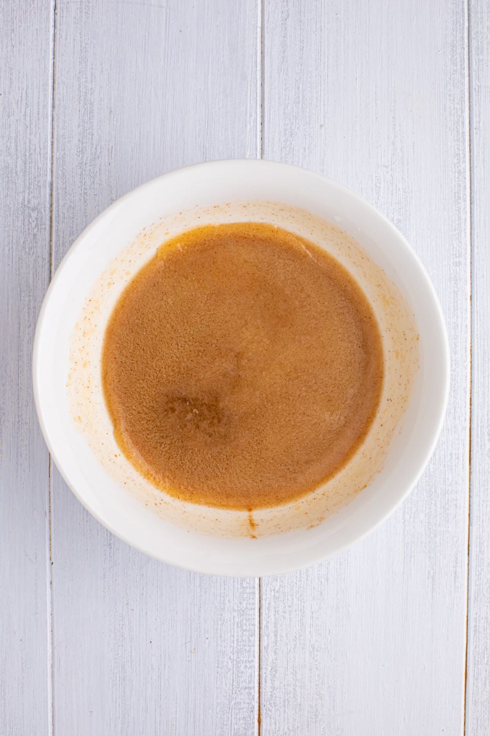 cinnamon sugar mixture in a white bowl on table