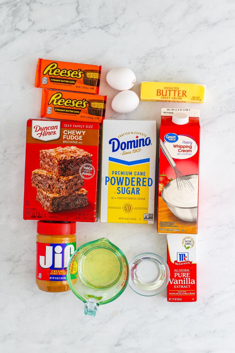 ingredients for Reeses Stuffed Brownies sitting in containers on table
