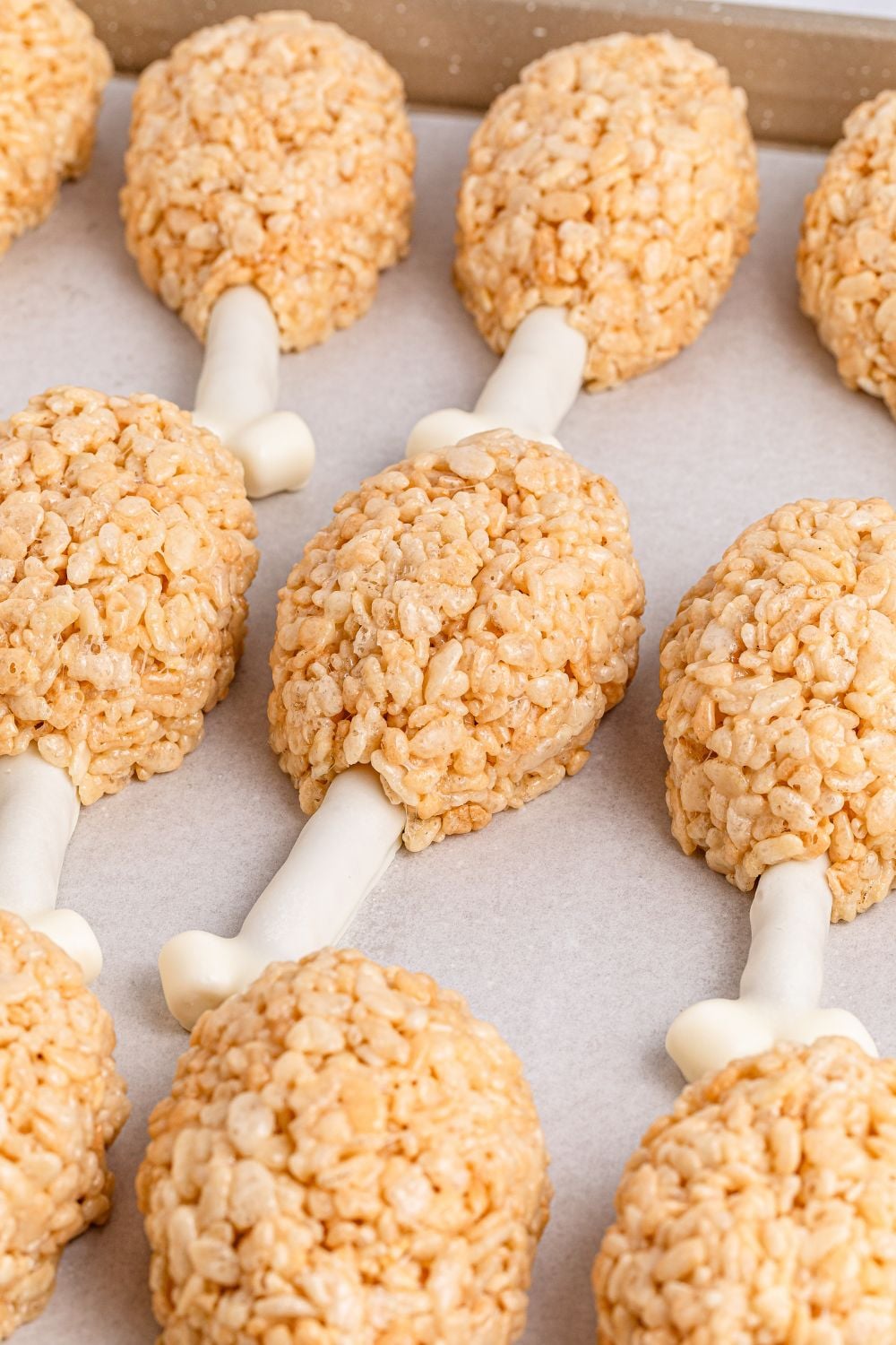 Rice Krispie Treat Turkey Legs on a white tray