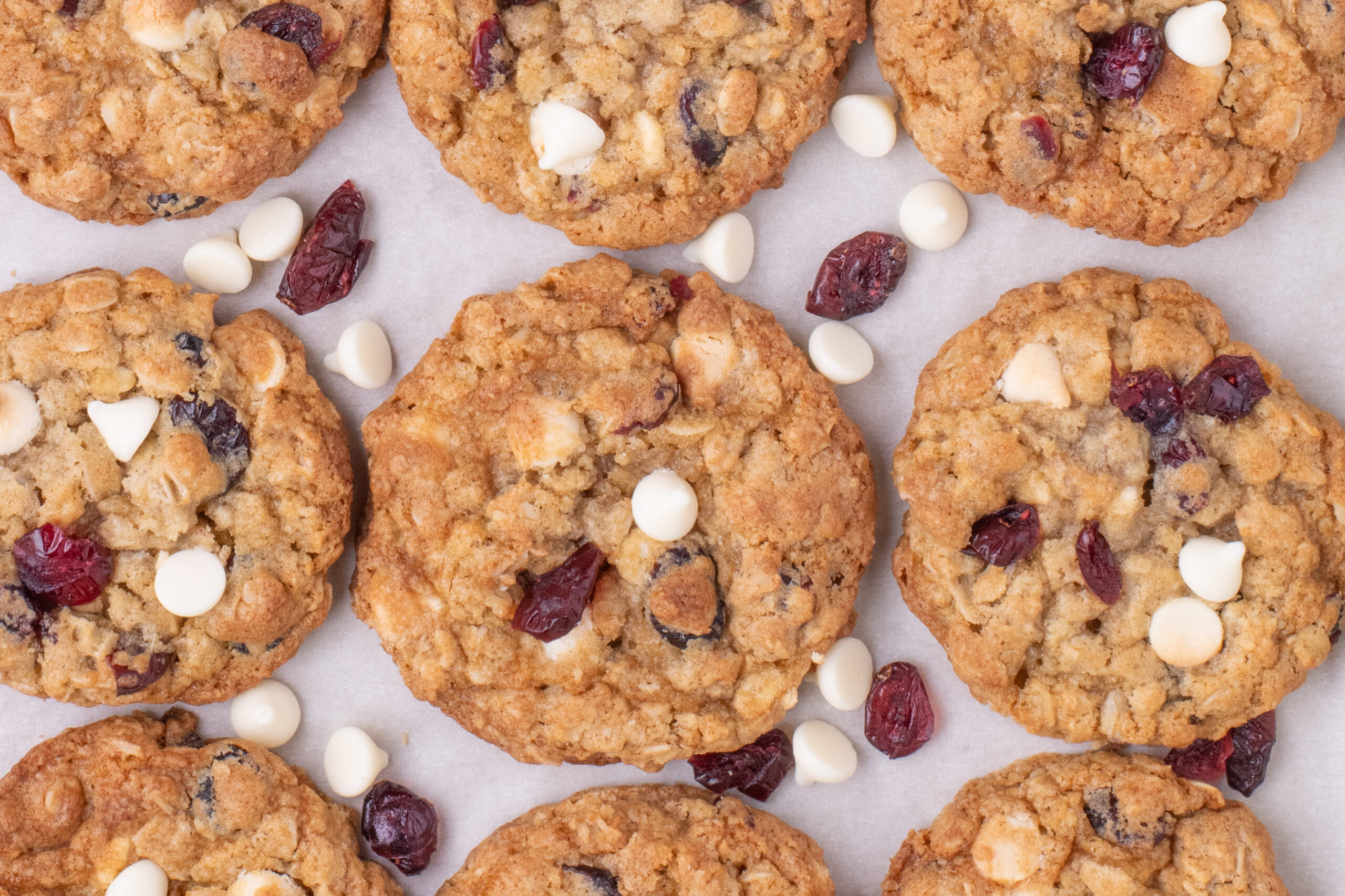 White Chocolate Cranberry Oatmeal Cookies placed spread out on counter