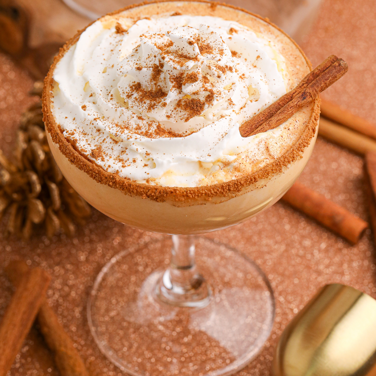 glass of pumpkin martinis on a table
