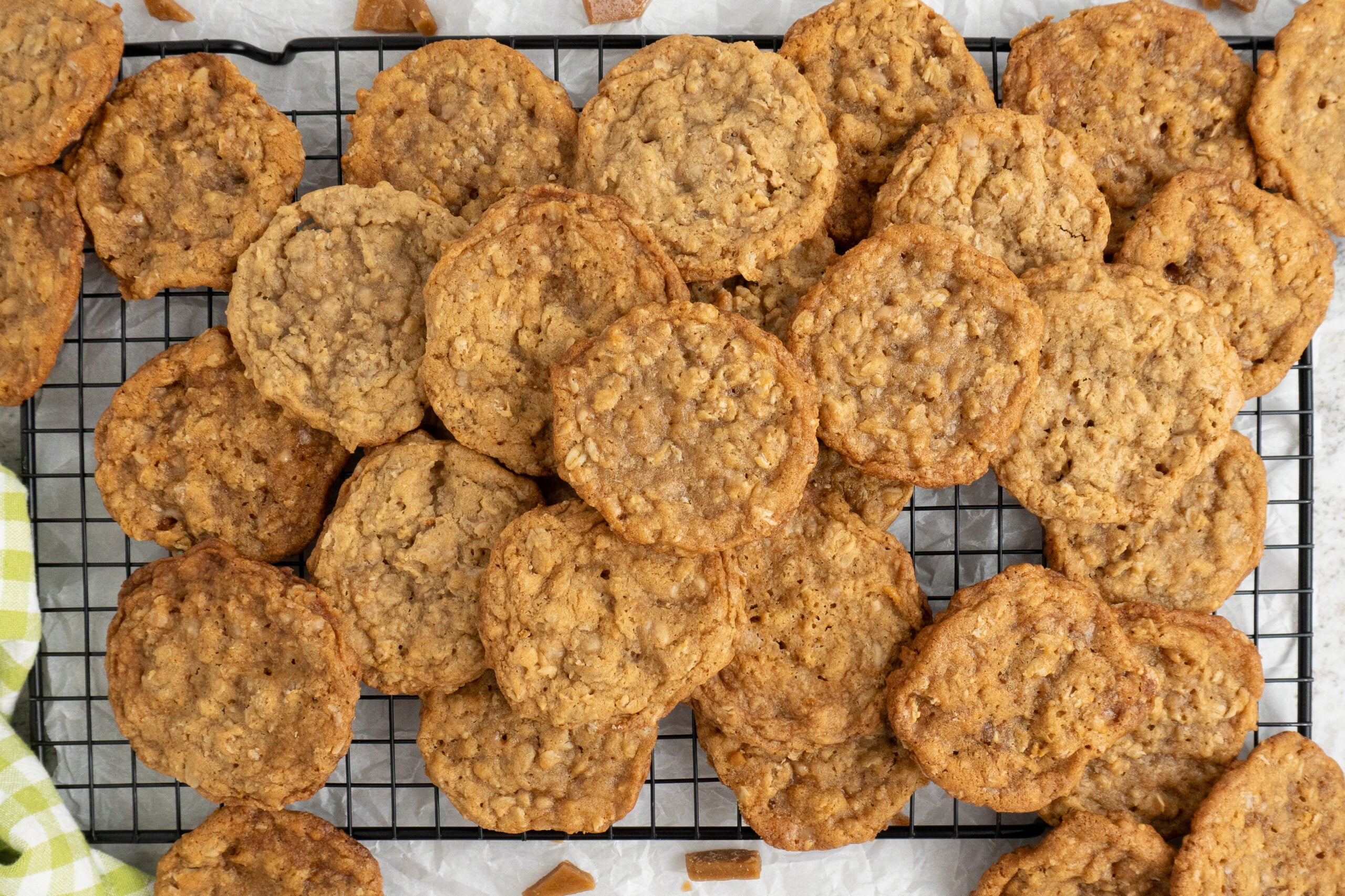 two dozen Oatmeal Toffee Cookies spread on a wire baking rack 