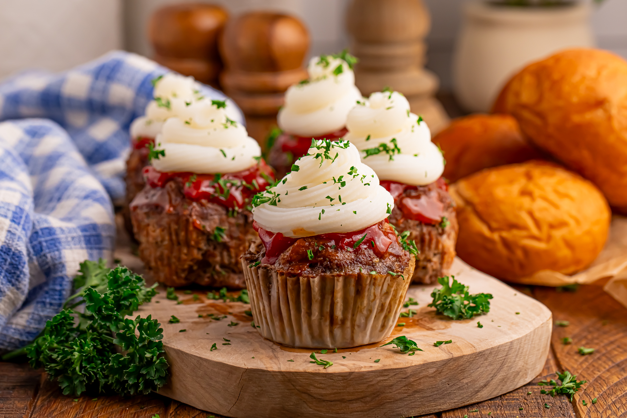 Meatloaf Cupcakes sitting on a tray to show the layers to the meat cupcake