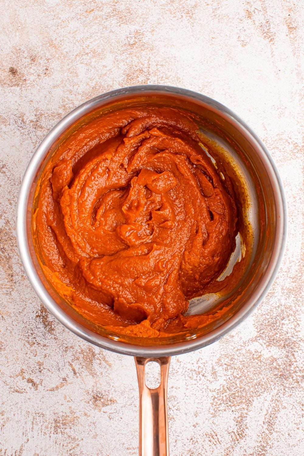 pumpkin batter in a sauce pan for the Marshmallow Pumpkin Pie