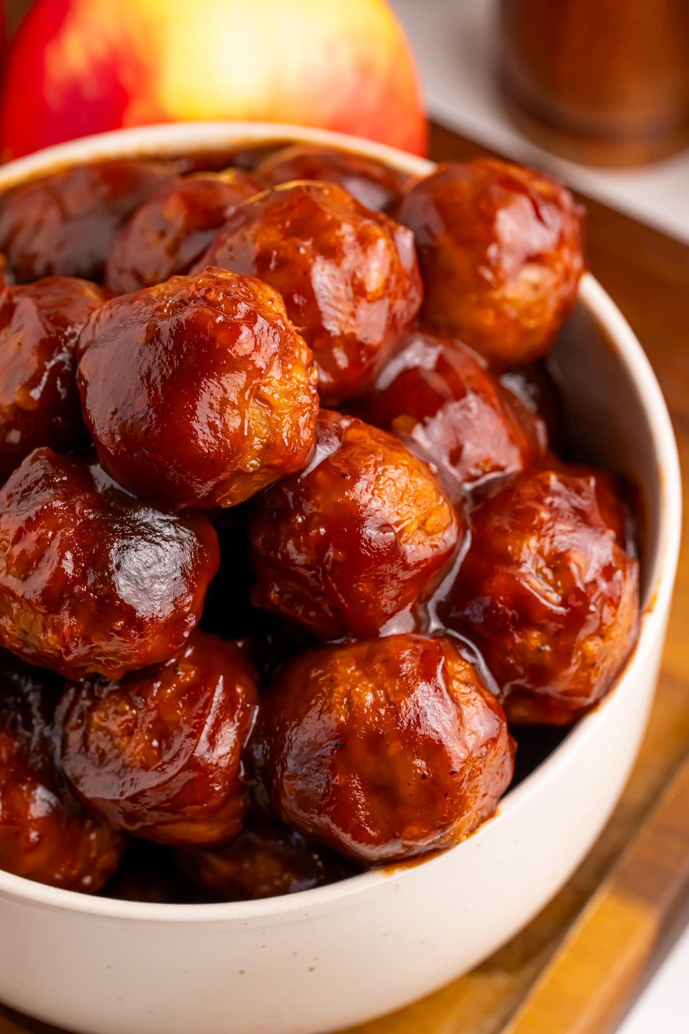 apple jelly meatballs in a bowl on table