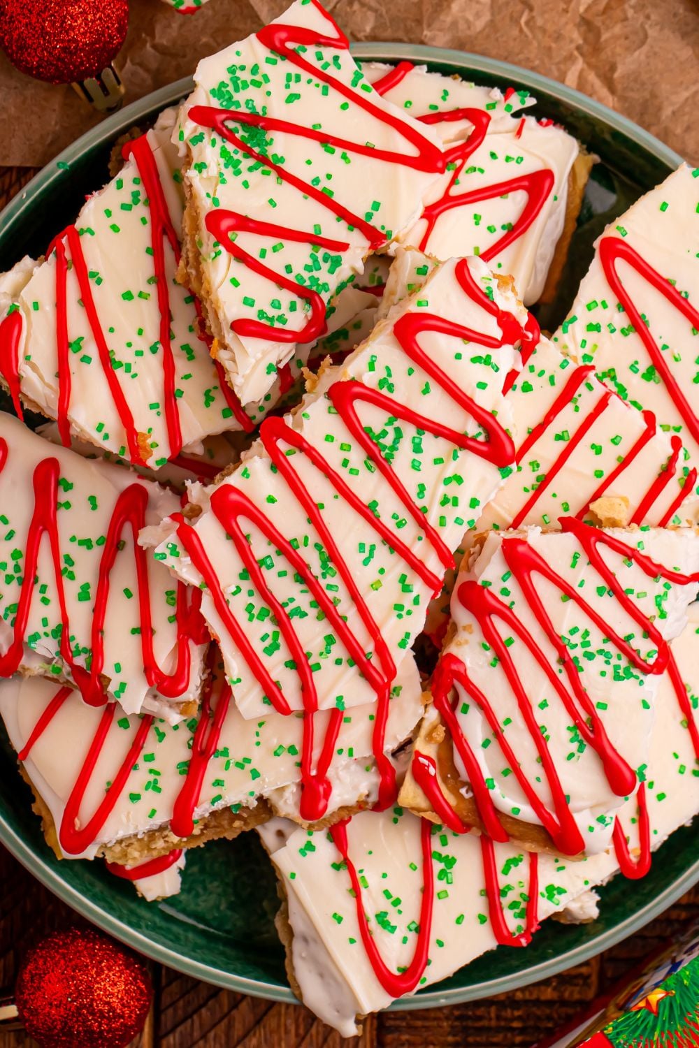 Christmas Tree Crack in a green plate on table broken apart 