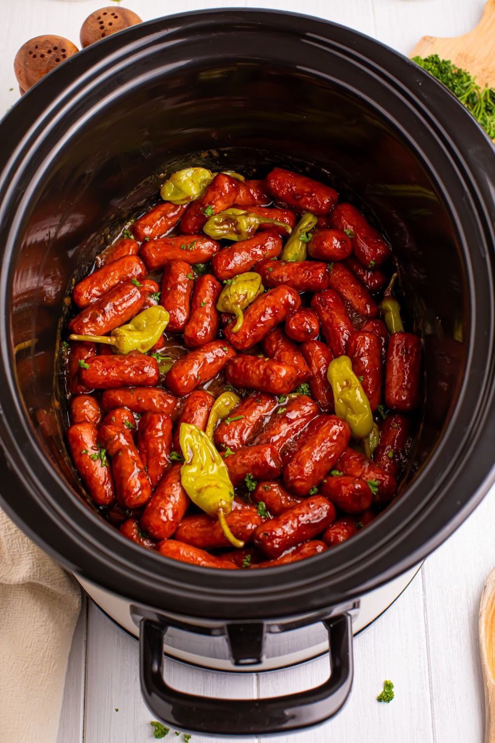 Slow Cooker Mississippi Lil Smokies in a slow cooker sitting on table 