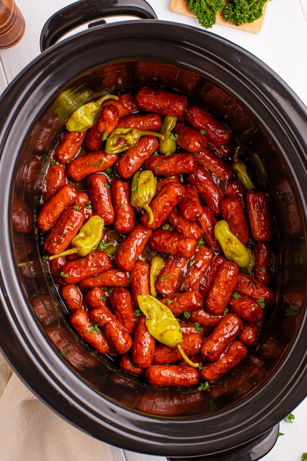 overhead of Slow Cooker Mississippi Lil Smokies on table 