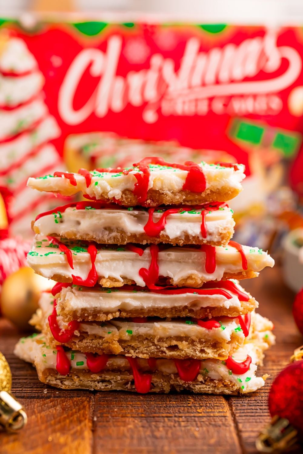 Christmas Tree Crack stacked on top of each other with Little Debbie cake box behind it on table 