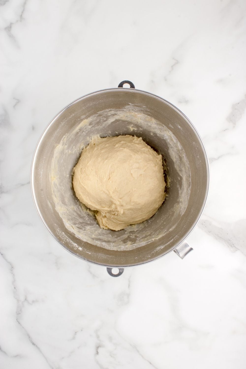 pull apart roll dough formed into a ball in a mixing bowl